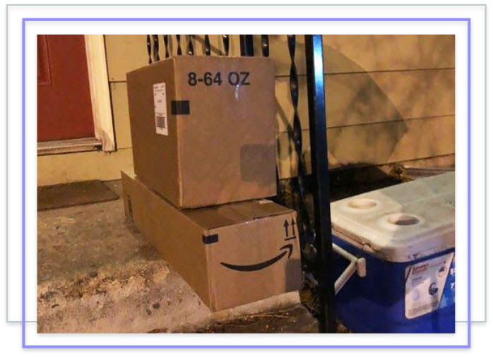 Image of Amazon boxes filled with trash
